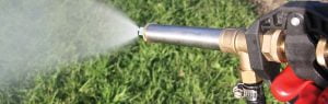 410-53-JetPro-Hand-Gun-in-field_Cone-Spray_web