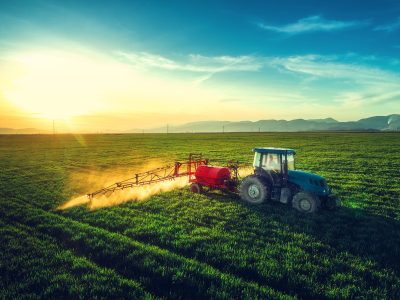 farming tractor spraying crops